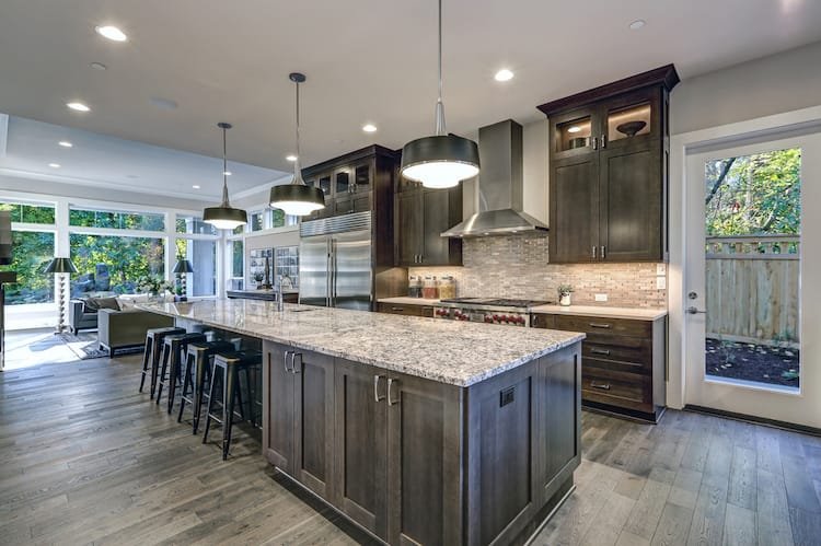 modern kitchen brown cabinets oversized island