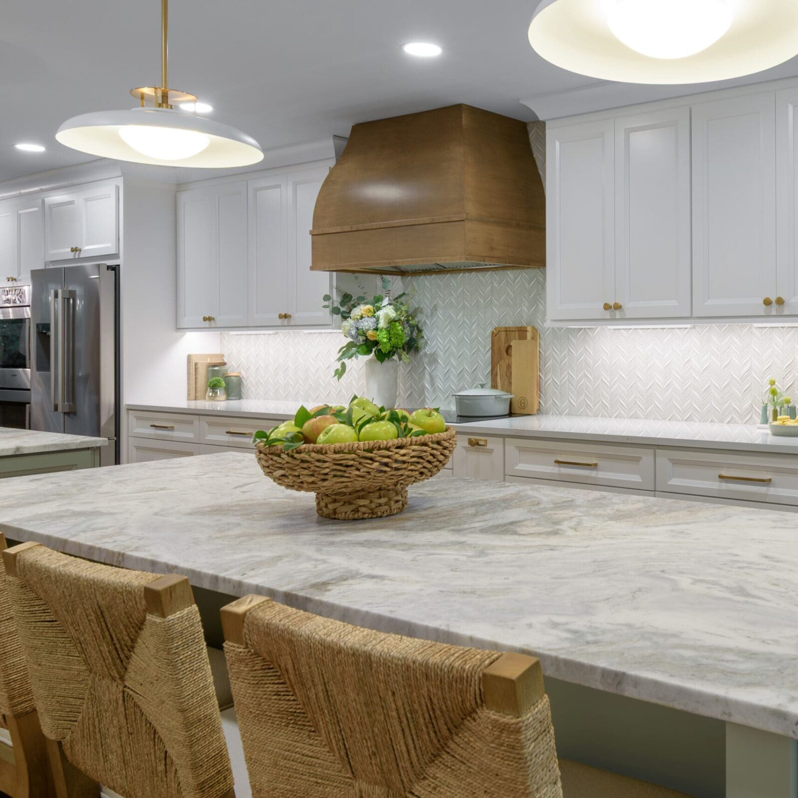 Leathered Fantasy Brown Hard Marble islands with Brunello Quartz perimeter countertops in Marietta, GA kitchen. - Main view with both islands