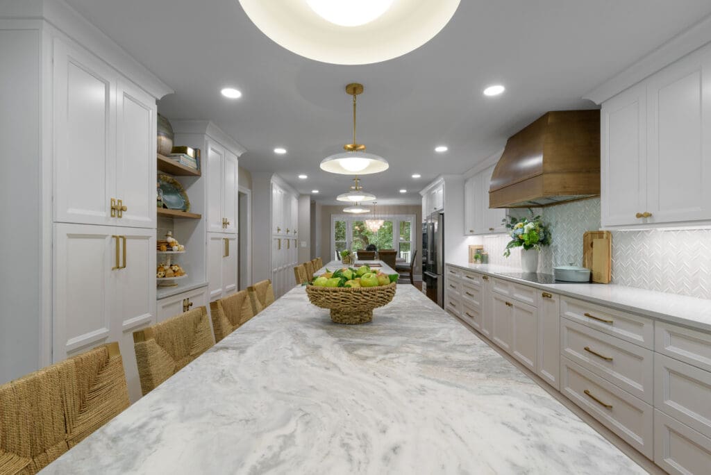 Leathered Fantasy Brown Hard Marble islands with Brunello Quartz perimeter countertops in Marietta, GA kitchen.