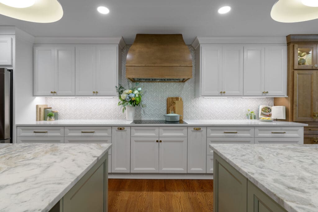 Leathered Fantasy Brown Hard Marble islands with Brunello Quartz perimeter countertops in Marietta, GA kitchen.