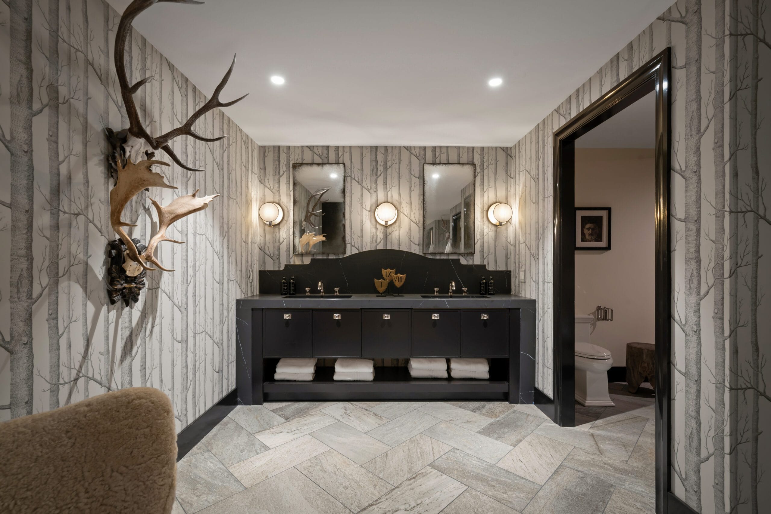 Wellness Center vanity with antler decor and Liem Black porcelain, Southeast Designer Showhouse 2026