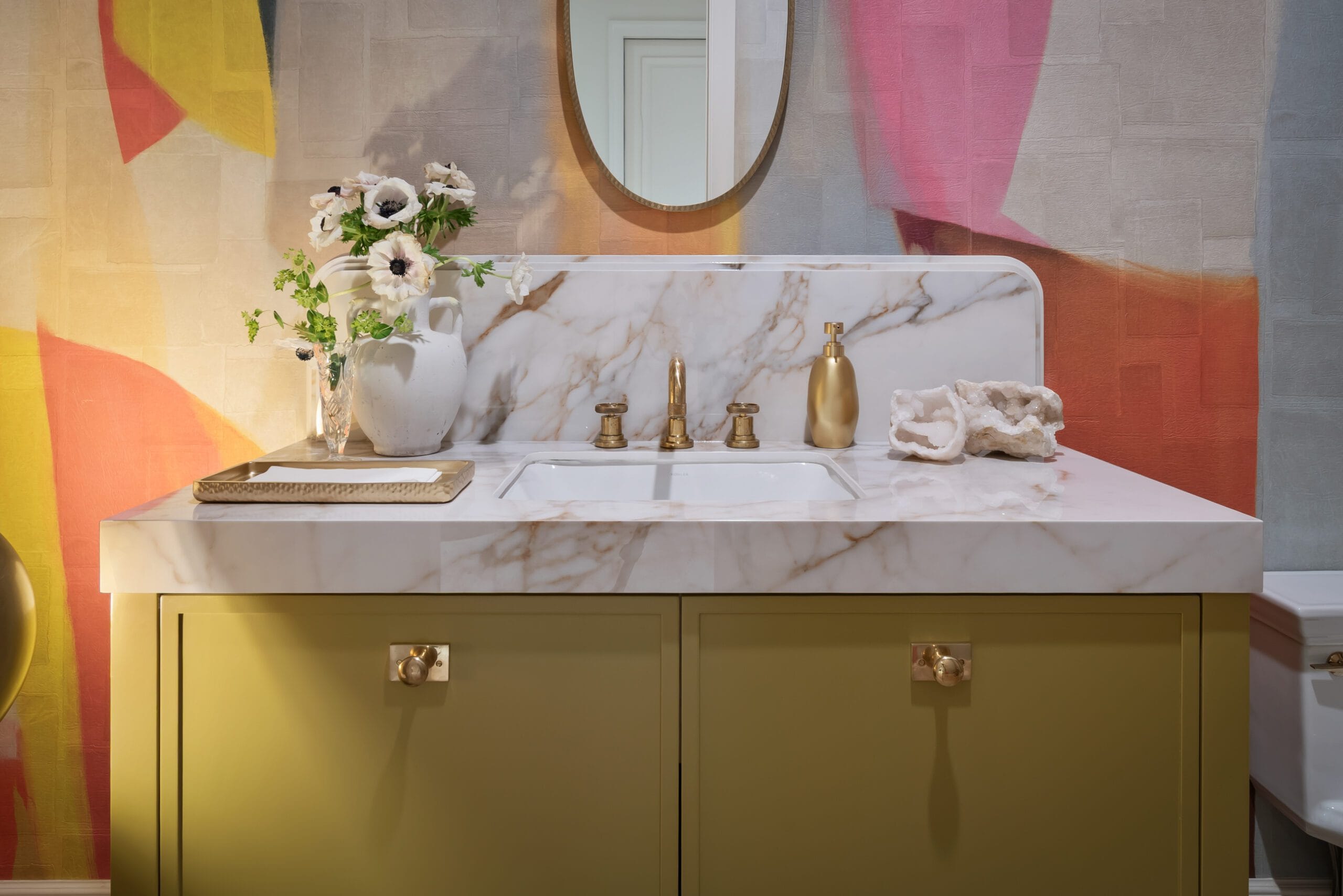 Calacatta Antico porcelain layered backsplash and floating vanity in the Art Deco Powder Room designed by Renee Chiarelli, Southeast Designer Showhouse 2026