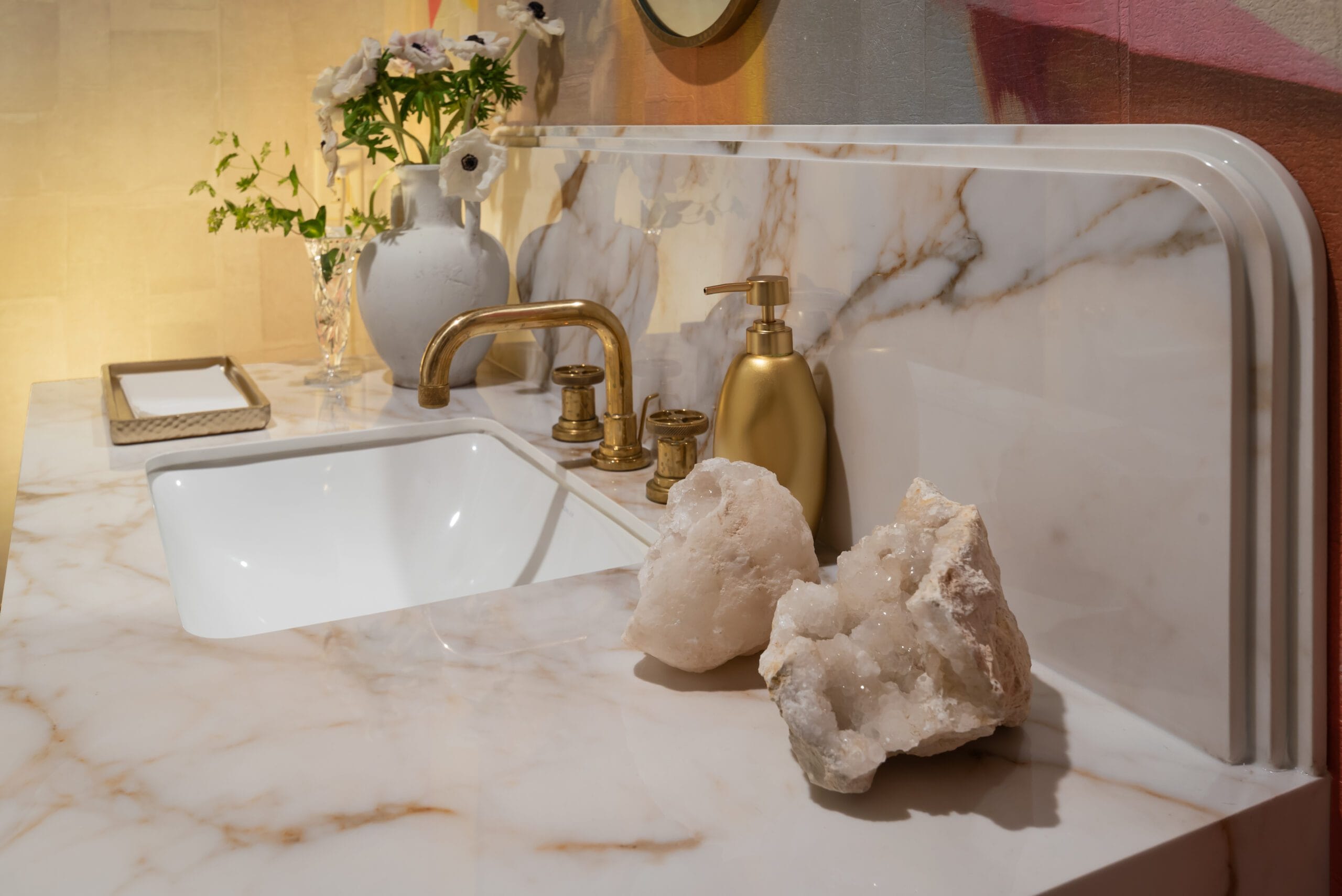 Art Deco Powder Room vanity with Calacatta Antico porcelain, brass fixtures, and warm tonal wallpaper, Southeast Designer Showhouse 2026