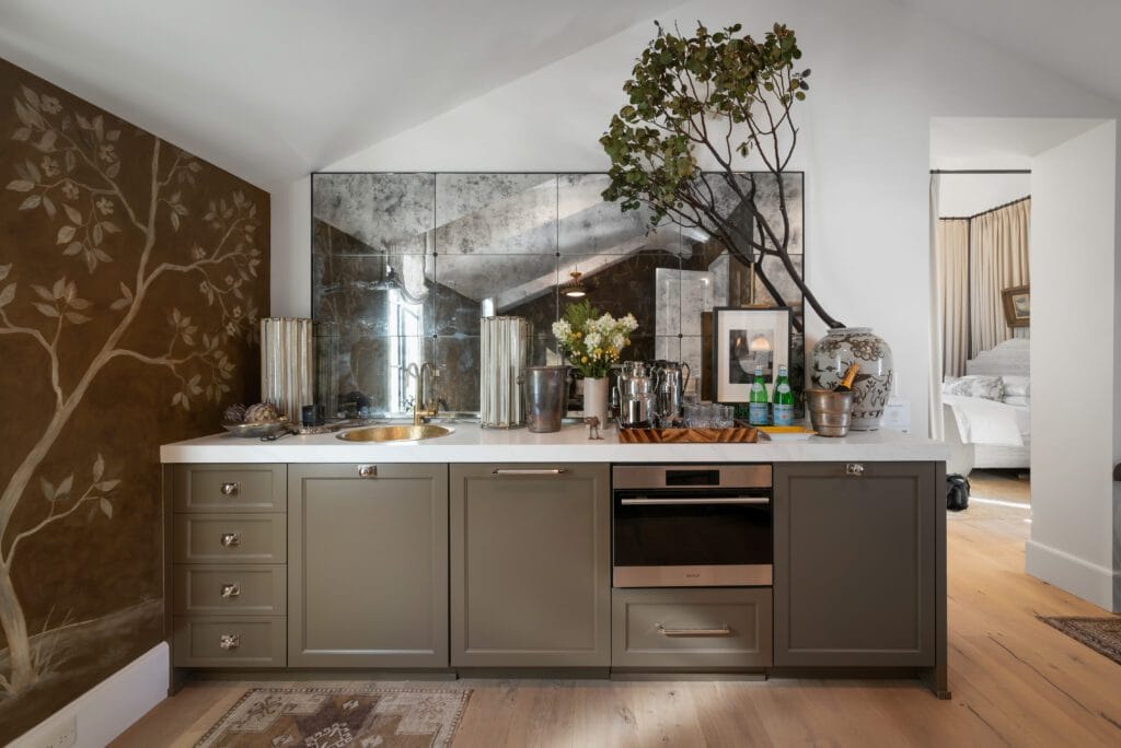 In-Law Suite kitchenette with white quartz countertop, brass sink, and chinoiserie wallpaper, Southeast Designer Showhouse 2026