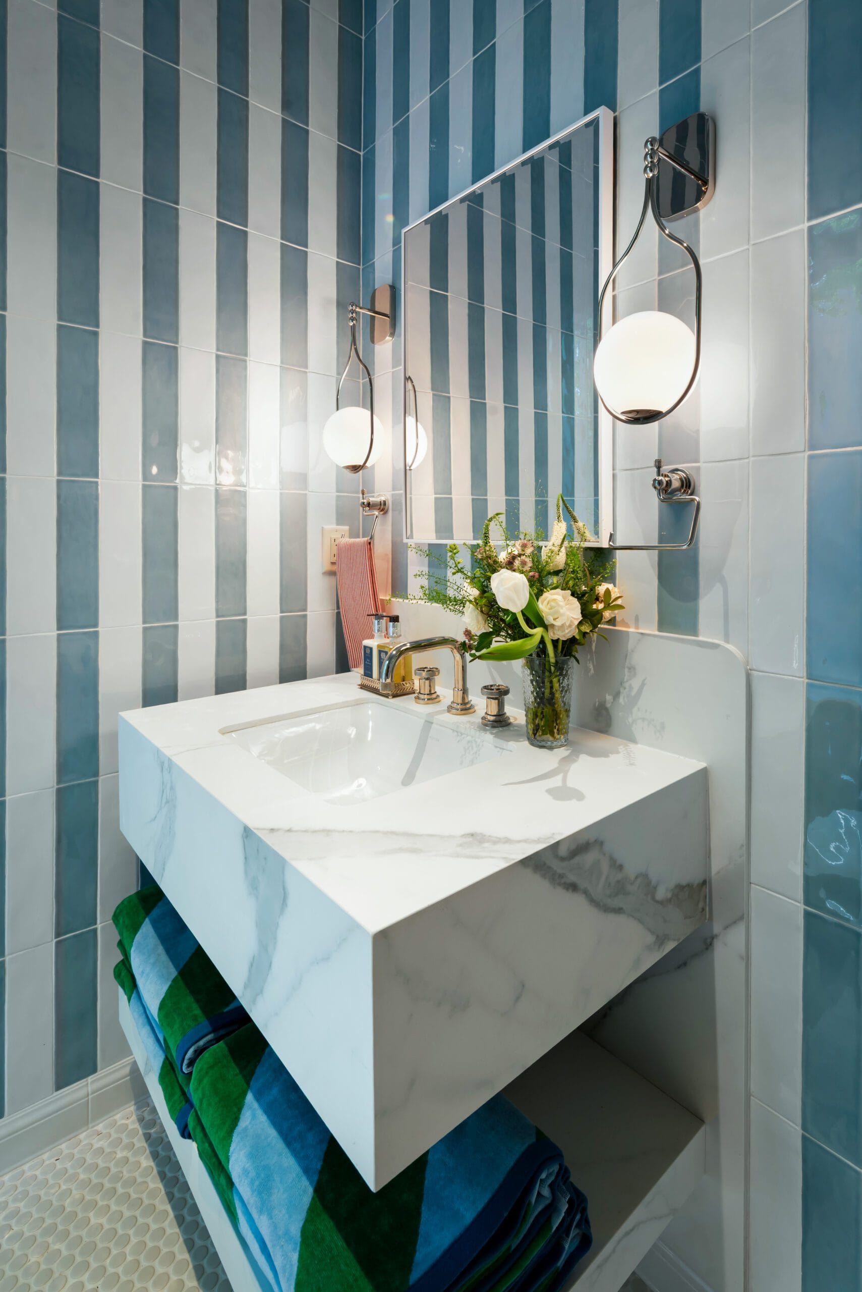 Pool Bath floating vanity detail with Aria White porcelain and brass faucet, Southeast Designer Showhouse 2026