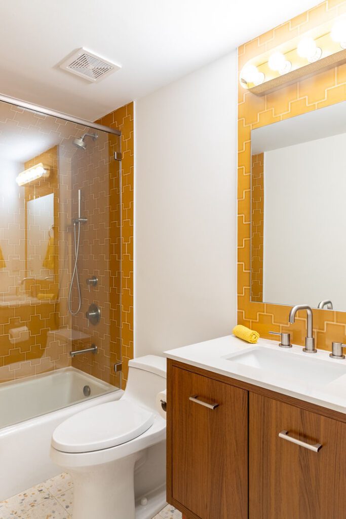 Honed Rhino White accent bath — walnut vanity, Doraville GA | GMS