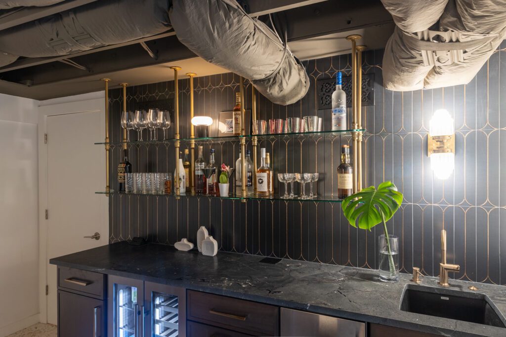 Black Diamond Quartzite wet bar — dark fluted tile, Doraville GA | GMS