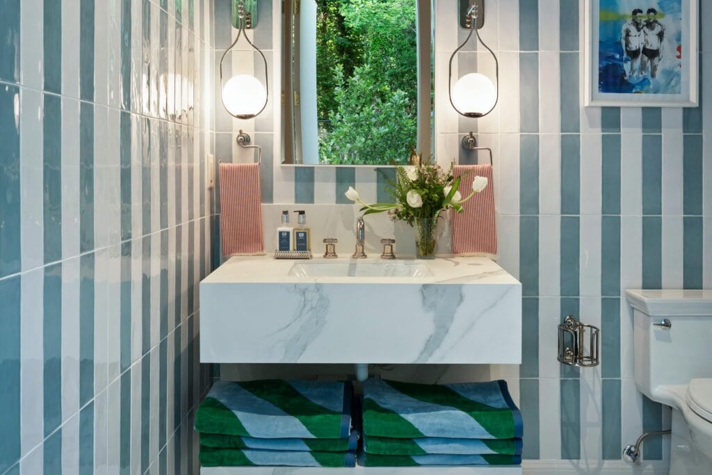 Aria White porcelain floating vanity in the Pool Bath designed by Claudia Stimmel, Southeast Designer Showhouse 2026